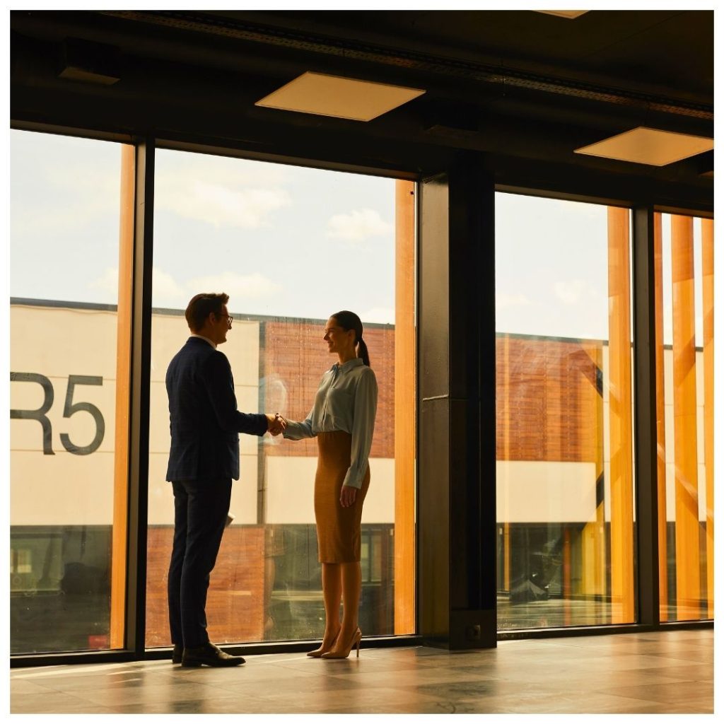 two people shaking hands