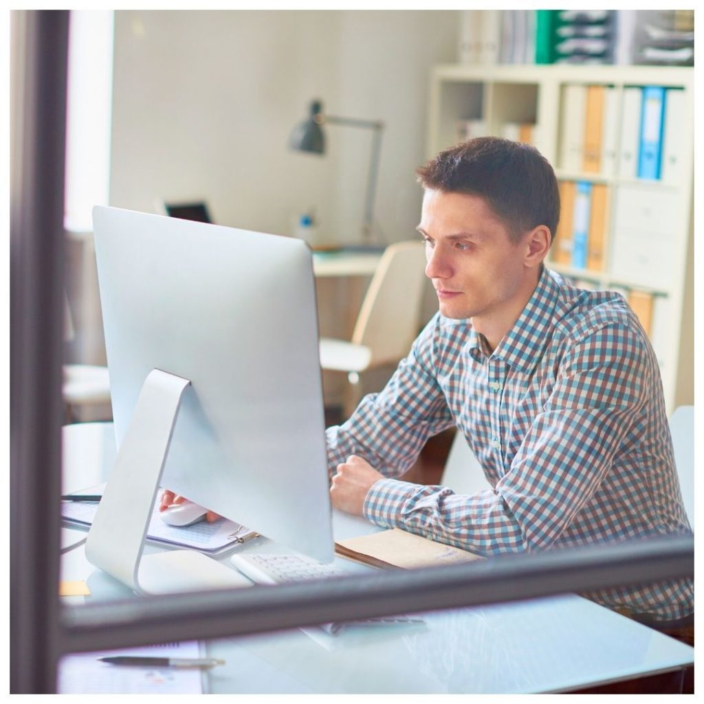 man working on computer