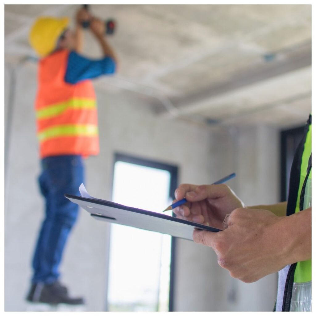 construction workers inspecting a business